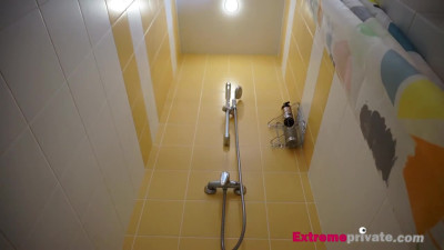 spying on stepmom as she rubs pussy in shower