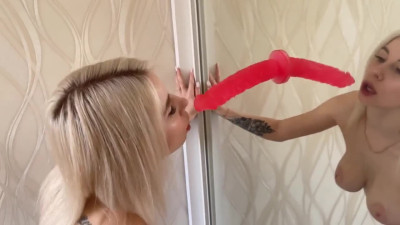 Big-Titted Blonde Handles Two Big Cocks
