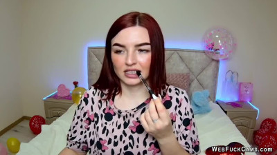 Busty redhead amateur babe NicolPot on webcam strips for fans