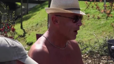 Some old people are having a garden party with whores