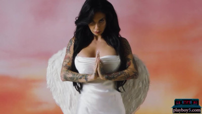 Busty MILF Joanna Angel shows her luscious body with tattoos for Playboy