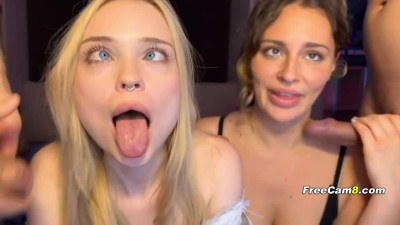 Two Slutty Babes Sucking Cock Side by Side