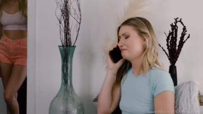Emma S and Kay L on a bed in a lesbian scene together